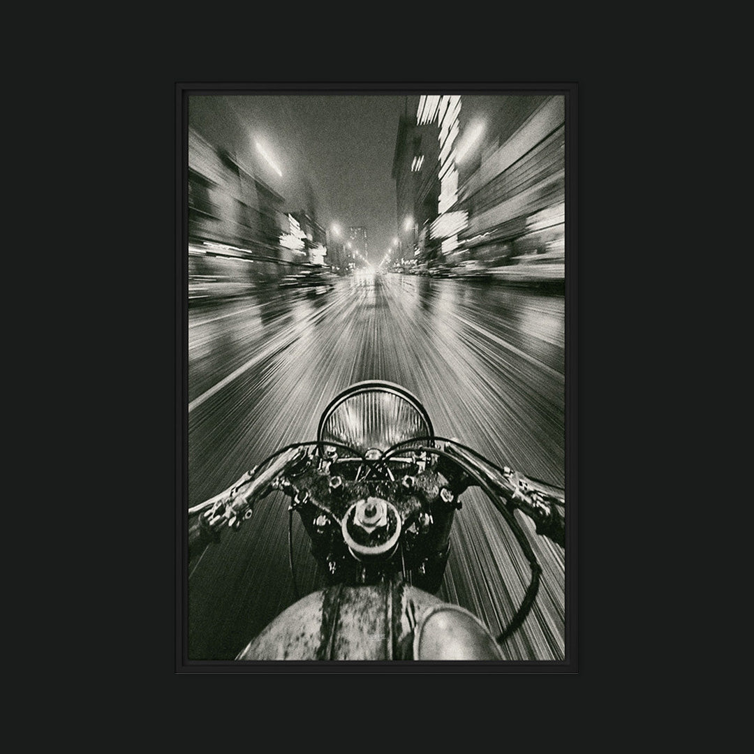 Framed Rush black and white motorcycle print with a rain-slicked urban vanishing point