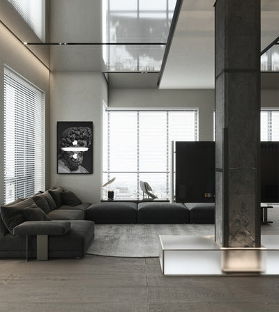 Division room mockup: monochrome bearded classical head crossed by a white division sign, shown in a tall living room beside large windows.
