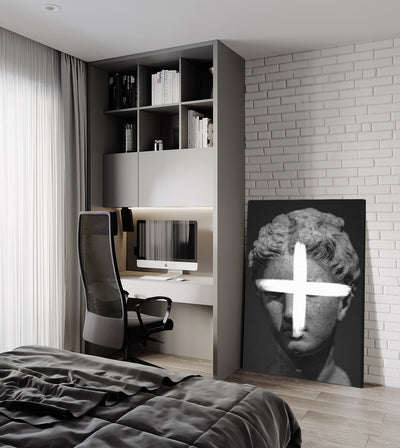 Addition room mockup: monochrome classical head crossed by a white plus sign, shown leaning beside a desk in a bedroom.