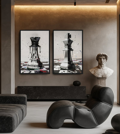 King & Queen Bundle room mockup: two chess artworks showing a split black-and-white king and a paint-marked queen, shown behind a sculptural black chair.