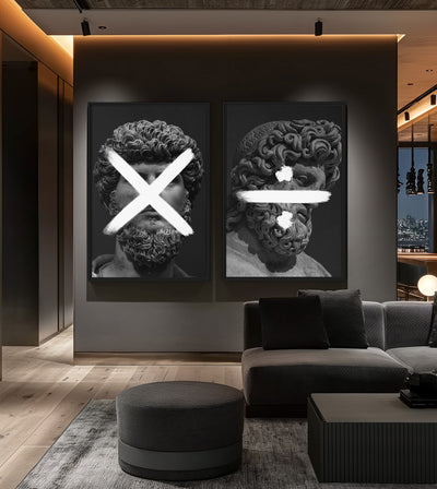 Product & Quotient Bundle room mockup: two monochrome classical heads with white multiplication and division signs, shown behind a dark sofa.