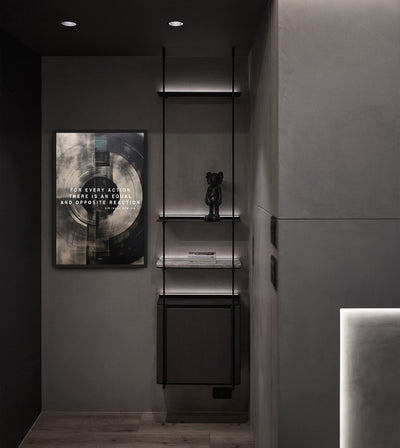 Newton's 3rd Law room mockup: dark concentric circles with the words FOR EVERY ACTION THERE IS AN EQUAL AND OPPOSITE REACTION, shown beside open hallway shelves.