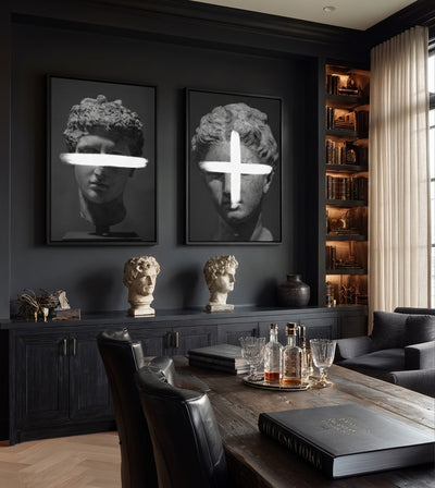Plus & Minus Bundle room mockup: two monochrome classical heads with white plus and minus signs, shown above a cabinet beside a dining table.