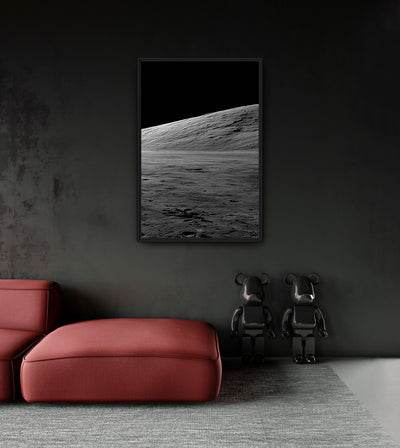 III. Beyond room mockup: a monochrome lunar slope rising from left to right beneath a black sky, shown above a red chaise.
