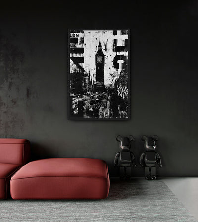 London room mockup: a black-and-white London collage centered on Big Ben with bold lettering and splashes, shown above a red chaise.