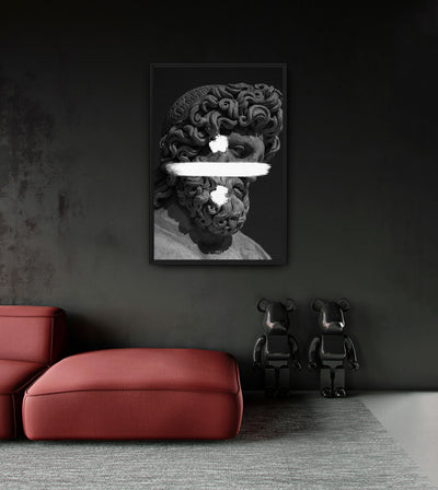 Division room mockup: monochrome bearded classical head crossed by a white division sign, shown above a red chaise.