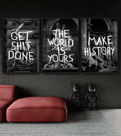 History in the Making Collection room mockup: three monochrome classical architecture artworks with GET SHIT DONE, THE WORLD IS YOURS and MAKE HISTORY lettering, shown above a red chaise.