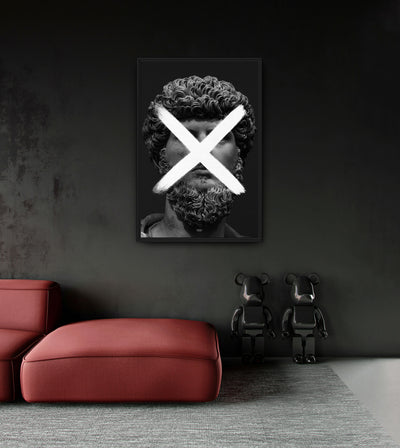 Multiplication room mockup: monochrome bearded classical head crossed by a white multiplication sign, shown above a red chaise.