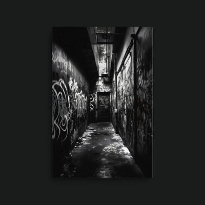 Richness in Poverty artwork view: a monochrome narrow alley covered in graffiti.