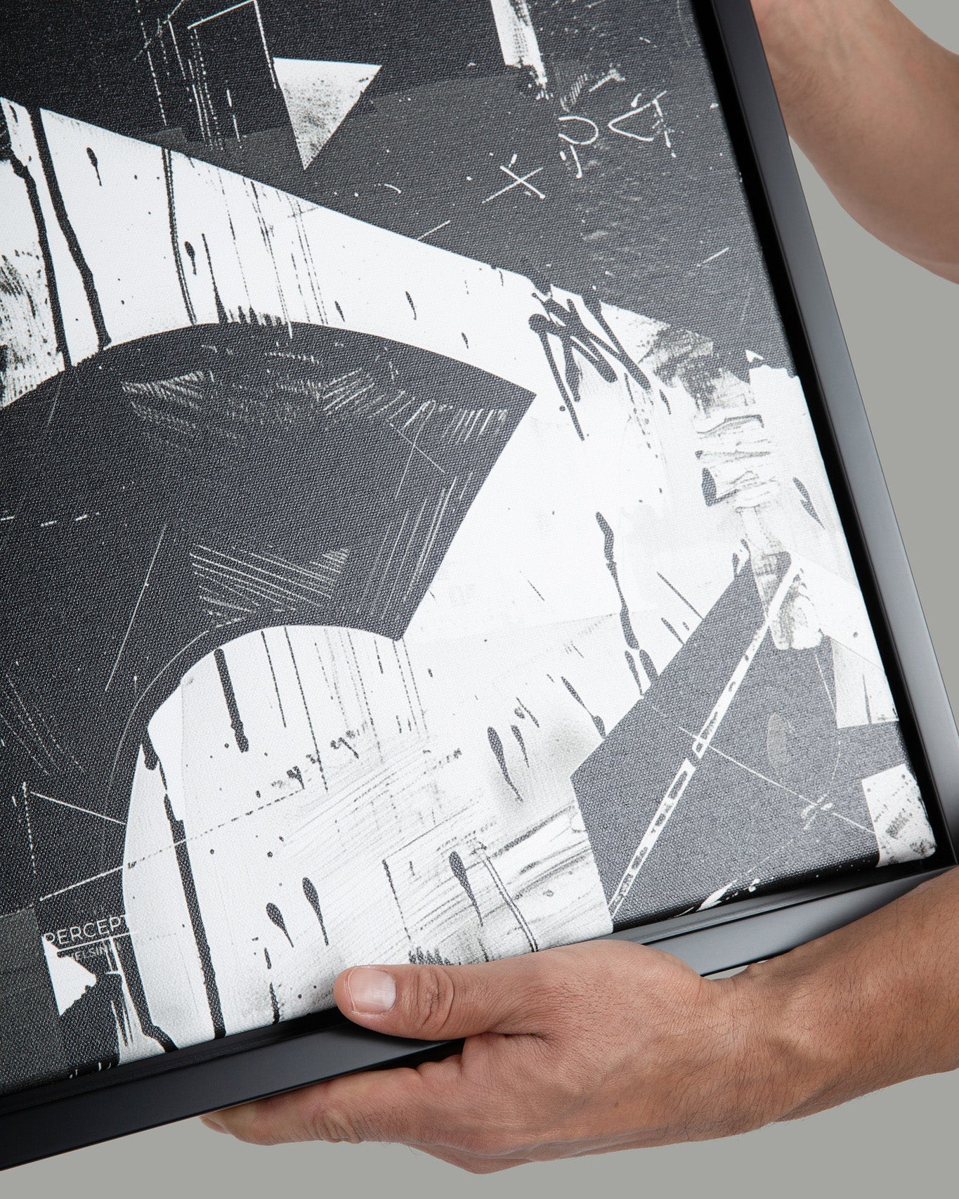 Close view showing the woven canvas and matte-black floating frame
